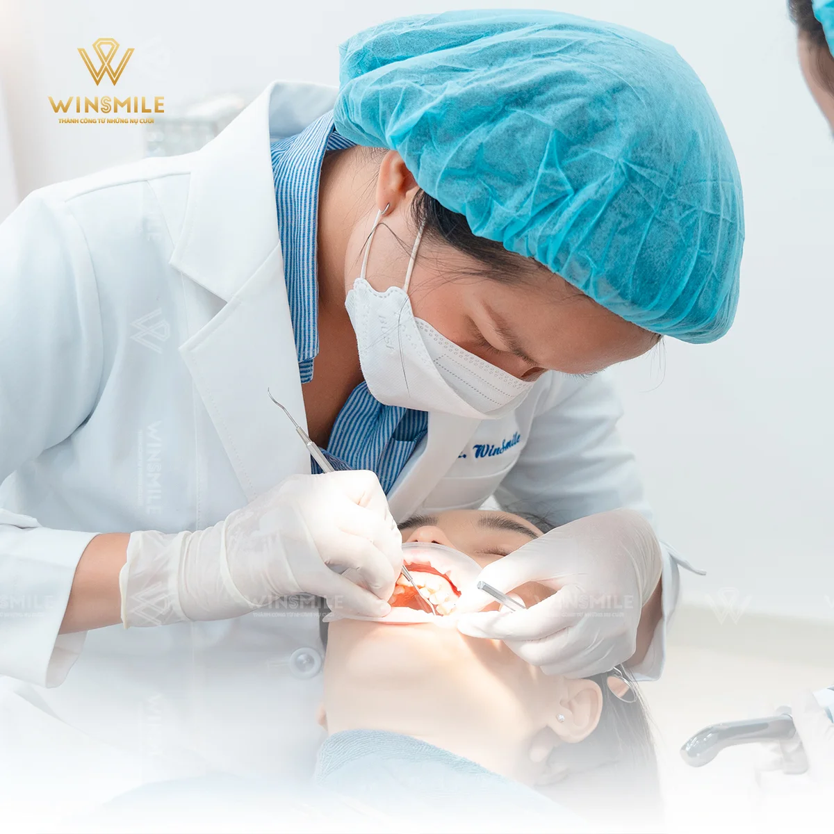 Dr. Ha carefully examining the dental condition.